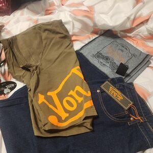 Von Dutch Olive T-Shirt with Orange Logo and Blue Jeans